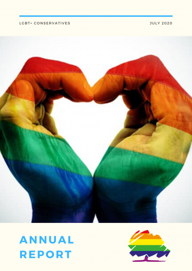 Annual Report cover.  Rainbow hands forming a heart shape.
